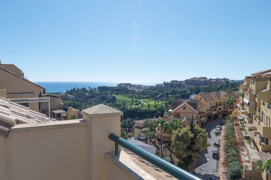 A furnished southwest-facing duplex penthouse in Torrequebrada with panoramic sea and golf views, expansive terraces and two garage parking spaces.